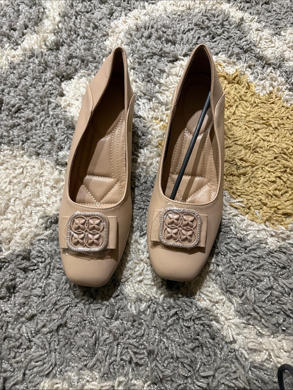 Neutral Square-Toe Leather Heel with Decorative Emblem